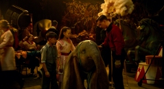 ON WITH THE SHOW – When a persuasive entrepreneur decides to make Dumbo a star at his larger-than-life entertainment venture, former circus star Holt Farrier (Colin Farrell) and his children Milly (Nico Parker) and Joe (Finley Hobbins) vow to stick with their beloved flying elephant the whole way. Directed by Tim Burton, Disney’s all-new, live-action, big-screen adventure “Dumbo” flies into theaters on March 29, 2019. ©2018 Disney Enterprises, Inc. All Rights Reserved.